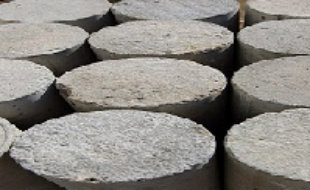 A closeup of concrete test cylinders